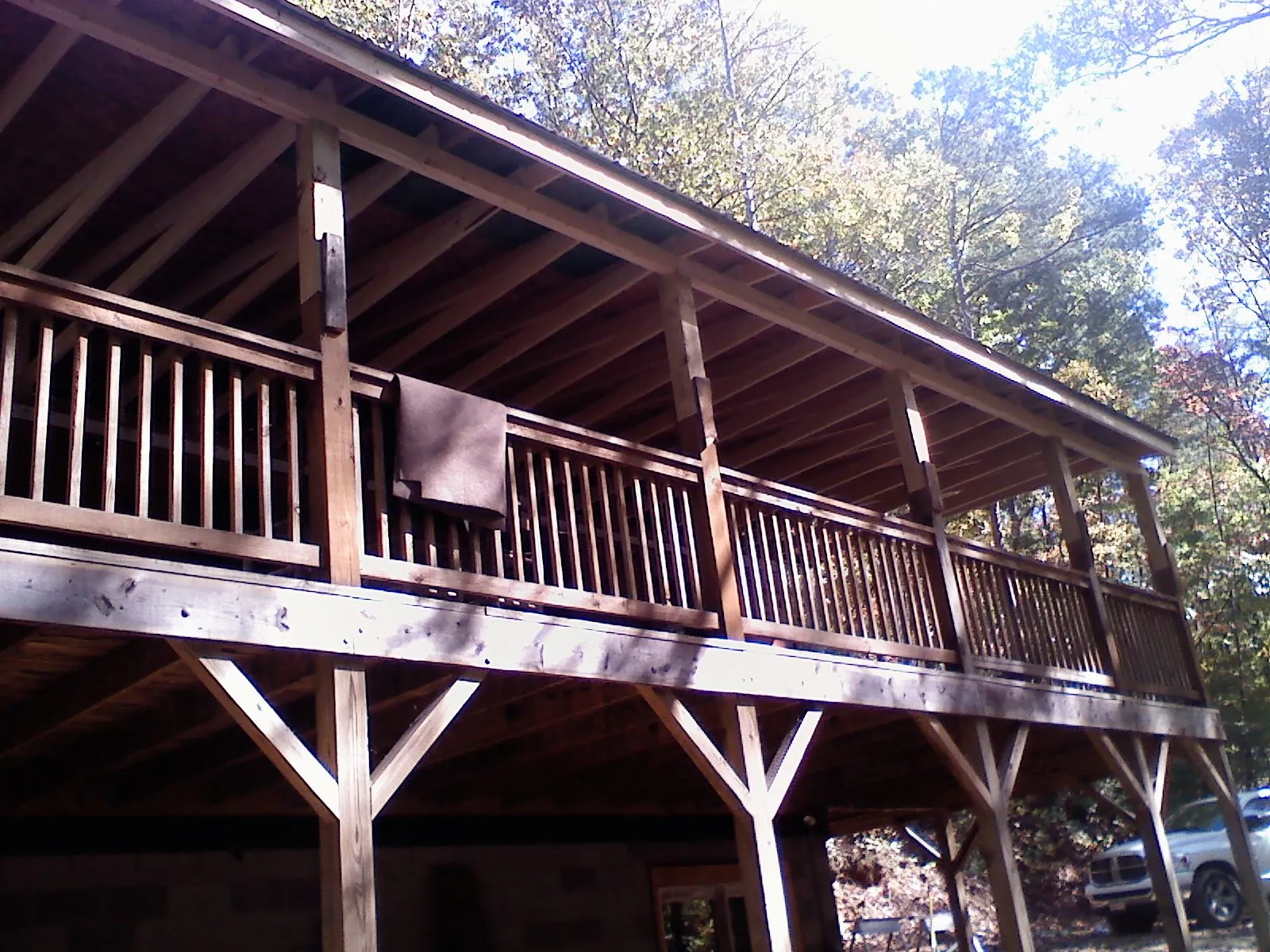 Timber framing under a new elevated porch and deck — Roof Leak Repair in Morrilton by Roofing Brothers